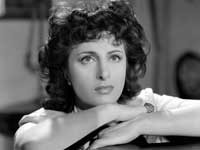 Anna Magnani, rivolta al fotografo